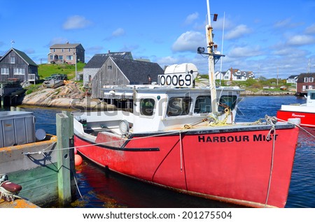 PEGGY\'S COVE NOVA SCOTIA JUNE 6: Typical fisherman boat in Peggy\'s Cove a small rural community located on the eastern shore of St. Margarets Bay in Nova Scotia on june 6 2014.