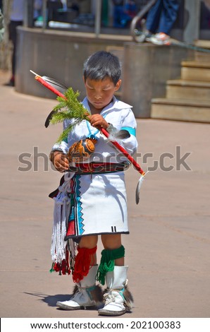 SANTA FE NEW MEXICO USA APRIL 21: Unidentified navajo Indian child on april 21 2014 in Santa Fe New Mexico USA. The largest U.S. Indian tribe, the Navajo Nation an about 106,800 live in New Mexico.
