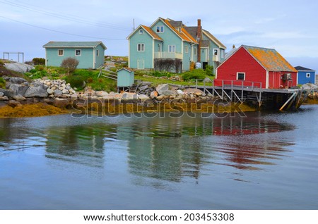 PEGGY\'S COVE NOVA SCOTIA JUNE 6: Typical fisherman shack in Peggy\'s Cove a small rural community located on the eastern shore of St. Margarets Bay in Nova Scotia on june 6 2014.
