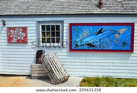 PEGGY\'S COVE NOVA SCOTIA JUNE 6: Street art in Peggy\'s Cove a small rural community located on the eastern shore of St. Margarets Bay in Nova Scotia on june 6 2014.