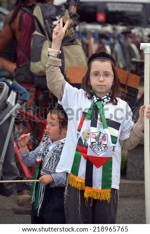 MONTREAL CANADA AUGUST 21:Unidentified kids from jewish Hasidic Orthodox Judaism, participating in a rally to condemn the Israel occupation an bombing on Gaza On 08 21 2014 in Montreal Quebec Canada