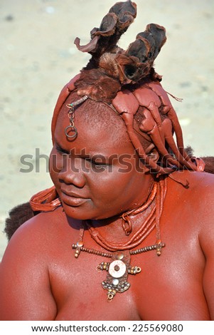 SWAKOPMUND, NAMIBIA OCTOBER 09, 2014: Unidentified woman from Himba tribe. The Himba are indigenous peoples living in northern Namibia, in the Kunene region of South-West Africa on october 09 2014
