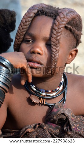 KHORIXAS, NAMIBIA- OCTOBER 09, 2014: Unidentified child Himba tribe. The Himba are indigenous peoples living in northern Namibia, in the Kunene region of South-West Africa on october 09 2014