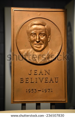MONTREAL CANADA DEC 04: Bronze of Jean Beliveau 1931- 2014 former hockey player inside the Bell Center on dec. 04 2014 in Montreal Canada. He was inducted into the Hockey Hall of Fame in 1972.