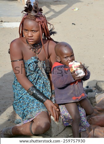 KHORIXAS, NAMIBIA OCT 09, 2014: Unidentified mother and child from Himba tribe. The Himba are indigenous peoples living in northern Namibia, in the Kunene region of South-West Africa on oct 09 2014