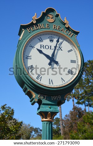 PEBBLE BEACH, CALIFORNIA APRIL 10, 2015 : Rolex clock in the public golf course of Pebble Beach april 10, 2015, in Monterey, California, USA Widely as one of the most beautiful courses in the world,