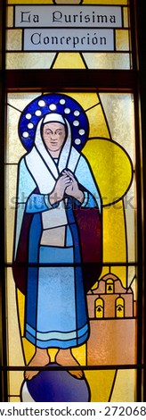 HALF MOON BAY CA USA APRIL 12: La PurÃ?Â­sima Concepcion ( Feast of the Immaculate Conception) stained gals window in Our Lady of the Pillar Church on april 12 2015 in Half Moon Bay, CA,