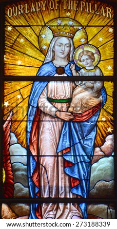 HALF MOON BAY CA USA APRIL 12: Our Lady of the Pillar stained glass window in Our Lady of the Pillar Church on april 12 2015 in Half Moon Bay, CA,