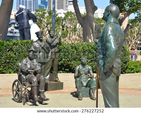 SAN DIEGO CA USA APRIL 8 2015: Bronze statues of A National Salute to Bob Hope and the Military. On the plaza, there are 15 bronze statues, arranged as if attending a Bob Hope show.