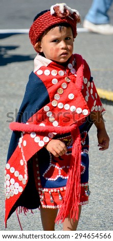 VICTORIA BC CANADA JUNE 24 2015: Native Indian unidentified child in traditional costume. First Nations in BC constitute a large number of First Nations governments and peoples in the province of  BC