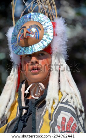 VICTORIA BC CANADA JUNE 24 2015: Unidentified Native Indian child in traditional costume. First Nations in BC constitute a large number of First Nations governments and peoples in the province of BC