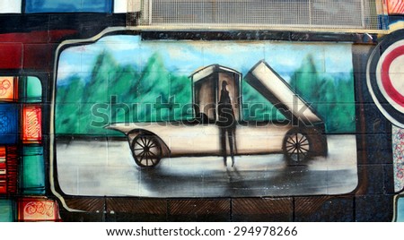 VICTORIA BC CANADA JUNE 22 2015: Industrial machine mural in Victoria is the perfect place to walk in the back alleys and abandoned areas, looking for street art