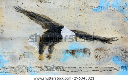 DUNCAN BC CANADA JUNE 21 2015: Mural bald eagle in Duncan (pop. 4,932) is a city on southern Vancouver Island in British Columbia, Canada. It is the smallest city by area in the nation