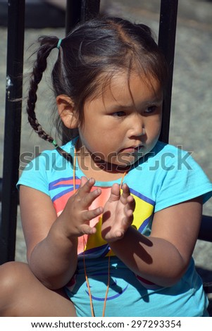VICTORIA BC CANADA JUNE 24 2015: Unidentified Native Indian girl. First Nations in BC constitute a large number of First Nations governments and peoples in the province of BC