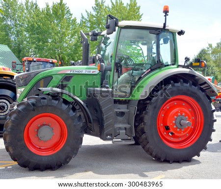 SAINT HYACINTHE QC CANADA JULY 25 2015: Tractor FENDT 718 Vario. Fendt is a German manufacturer of agricultural tractors machines, manufacturing a full line of tractors, combine harvesters and balers.
