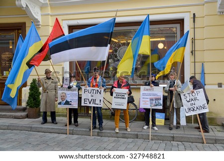 TALLINN ESTONIA 09 27 2015: Anti-Russian against V.Putin protest in connection with military aggression of Russia against Ukraine and flight MH17 Malaysian air line in front the Russian embassy.