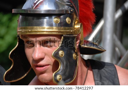 MONTREAL - AUGUST 14: Young man dressed as Roman soldier during reenactment show in Divers/cite festival on August 14, 2010 in Montreal, Canada