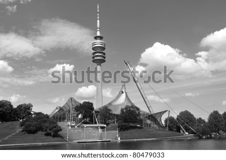 Munich, Germany. The Olympiaturm has an overall height of 291 m and a weight of 52,500 tonnes. At a height of 190 m there is an observation platform as well as a small rock and roll museum.