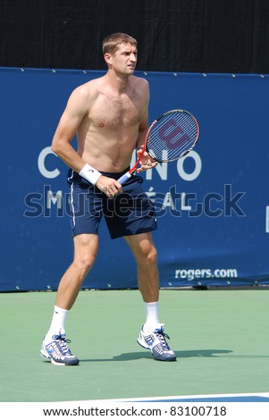 MONTREAL - AUGUST 7:  Max Mirnyi on training court of Montreal Rogers Cup on August 7, 2011 in Montreal, Canada. Max Is a professional tennis player from Belarus