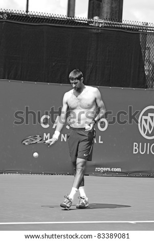 MONTREAL - AUGUST 7: Max Mirnyi on training court of Montreal Rogers Cup on August 7, 2011 in Montreal, Canada. Max Is a professional tennis player from Belarus