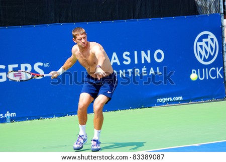 MONTREAL - AUGUST 7: Max Mirnyi on training court of Montreal Rogers Cup on August 7, 2011 in Montreal, Canada. Max Is a professional tennis player from Belarus