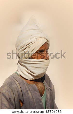 VALLEY OF THE KINGS, EGYPT- NOV 22: Unidentified man work for excavation of tombs and buried treasure on November 22, 2009, Valley of the Kings, Egypt, often called the Valley of the Gates of the Kings