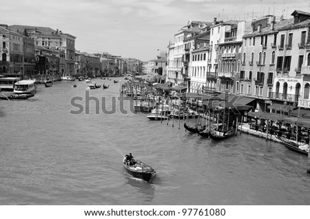 VENICE - JUNE 12: Tourists visit the Grand canal on June 11, 2011 in Venice, Italy. More than 20 million tourists come to Venice annually.