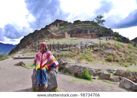 CUSCO PERU - NOVEMBER 26: Portrait of unidentified child in traditional clothing, on November 5, 2010 in Cusco, Peru. Some children have to walk 2 hours a day for to go school in Peruvian mountain.