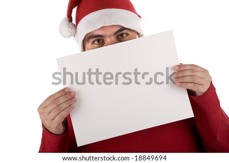 man wearing a red santa hat holding blank billboard