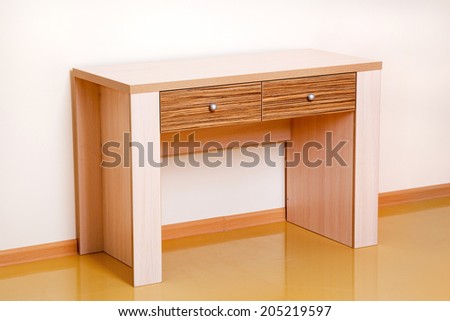 study desk with drawers in the room