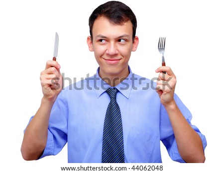 hungry young man with a knife and a fork
