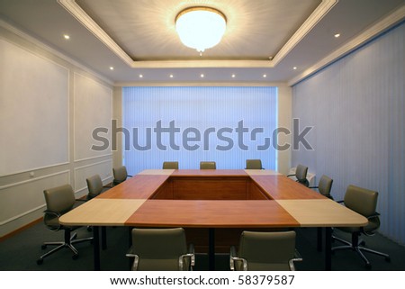 wide angle shot of an empty business meeting and conference room