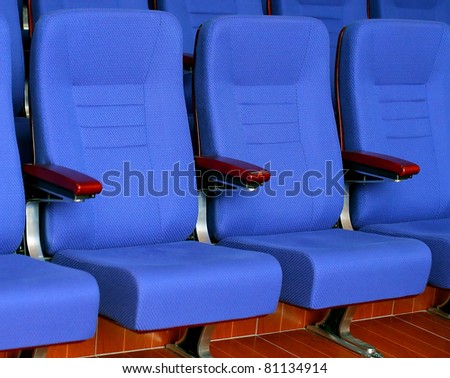 blue chair seats in an empty movie theater. conference room