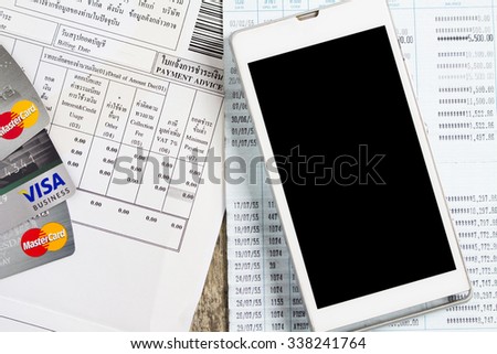 BUNGKAN, THAILAND - NOVEMBER 10, 2015: smart phone and billing and credit card on the table, payment online concept