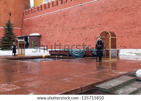 MOSCOW - APRIL 07: Guard of Honor at the tomb of the Unknown Soldier at the wall of Moscow Kremlin on April 07, 2013 in Moscow, Russia.