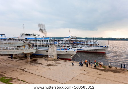 SAMARA, RUSSIA - JUNE 11: River cruise passenger ships at the moored on Volga river on June 11, 2012 in Samara, Russia. Volga is the longest river in Europe