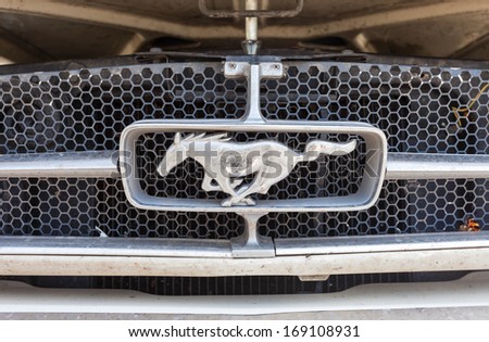 SAMARA, RUSSIA - JUNE 16, 2013: Emblem on the retro car Ford Mustang Fastback, 1964 year. The Ford Mustang is an automobile manufactured by the Ford Motor Company