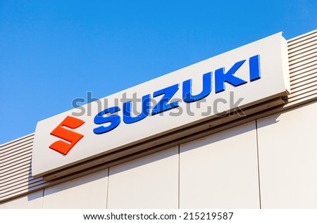 SAMARA, RUSSIA - AUGUST 30, 2014: Suzuki dealership sign against blue sky. Suzuki Motor Corporation is a Japanese multinational corporation
