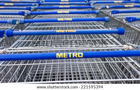 SAMARA, RUSSIA - OCTOBER 4, 2014: Large empty blue shopping cart Metro store. Metro Group is a German global diversified retail group based in Dusseldorf