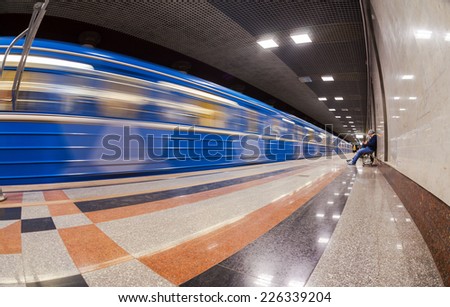 SAMARA, RUSSIA - OCTOBER 25, 2014: Passengers await the arrival of the train at subway station Rossiyskaya