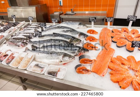SAMARA, RUSSIA - OCTOBER 26, 2014: Raw fish ready for sale in the supermarket Magnit. One of largest retailer in Russia