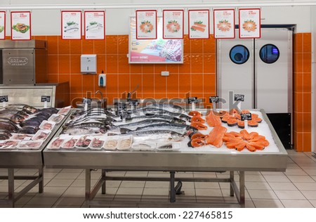 SAMARA, RUSSIA - OCTOBER 26, 2014: Raw fish ready for sale in the supermarket Magnit. One of largest retailer in Russia