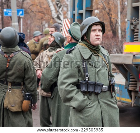 SAMARA, RUSSIA - NOVEMBER 7, 2014: Member of Historical reenactment in German Army uniform after battle. The battle he is reenacting was the Moscow Battle held in 1941