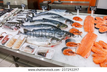 SAMARA, RUSSIA - OCTOBER 26, 2014: Raw fish ready for sale in the supermarket Magnit. One of largest food retailer in Russia