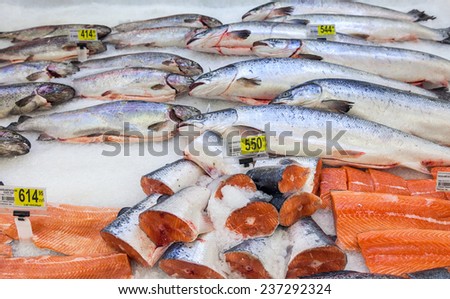 SAMARA, RUSSIA - NOVEMBER 1, 2014: Raw fish ready for sale in the hypermarket Karusel. One of largest food retailer in Russia