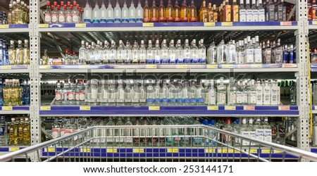 SAMARA, RUSSIA - FEBRUARY 15, 2015: Showcase alcoholic beverages at the hypermarket METRO. Metro Group is a German global diversified retailer