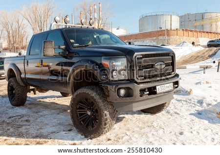 SAMARA, RUSSIA - FEBRUARY 23, 2015: Off-road 4x4 car Ford on the road in the wintertime close-up