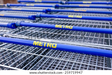 SAMARA, RUSSIA - OCTOBER 4, 2014: Large empty blue shopping cart Metro store. Metro Group is a German global diversified retail group based in Dusseldorf
