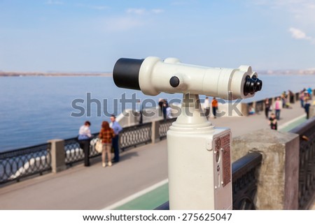 SAMARA, RUSSIA - MAY 1, 2015: Coin operated binocular on the bank of river Volga in summertime