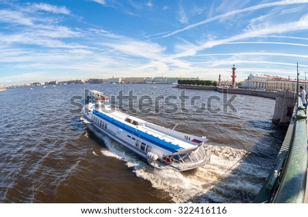 ST.PETERSBURG, RUSSIA - AUGUST 7, 2015: River cruise boats on the Neva river in summer sunny day